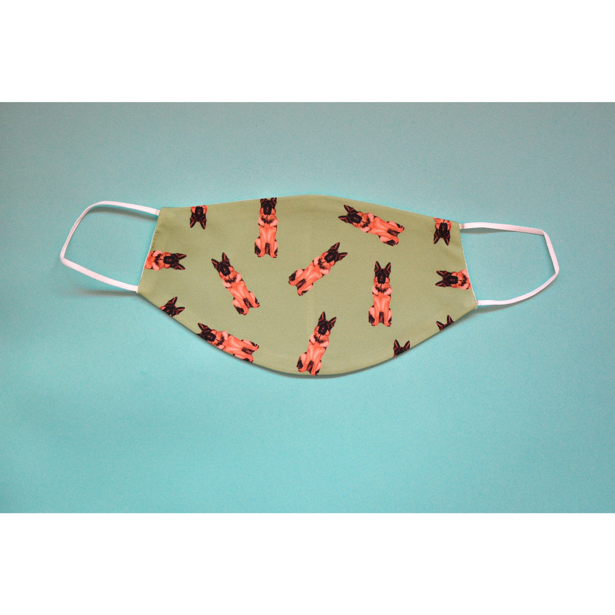 A stylish German Shepherd face cover, handmade with breathable polyester and organic cotton, featuring a unique design for dog lovers.