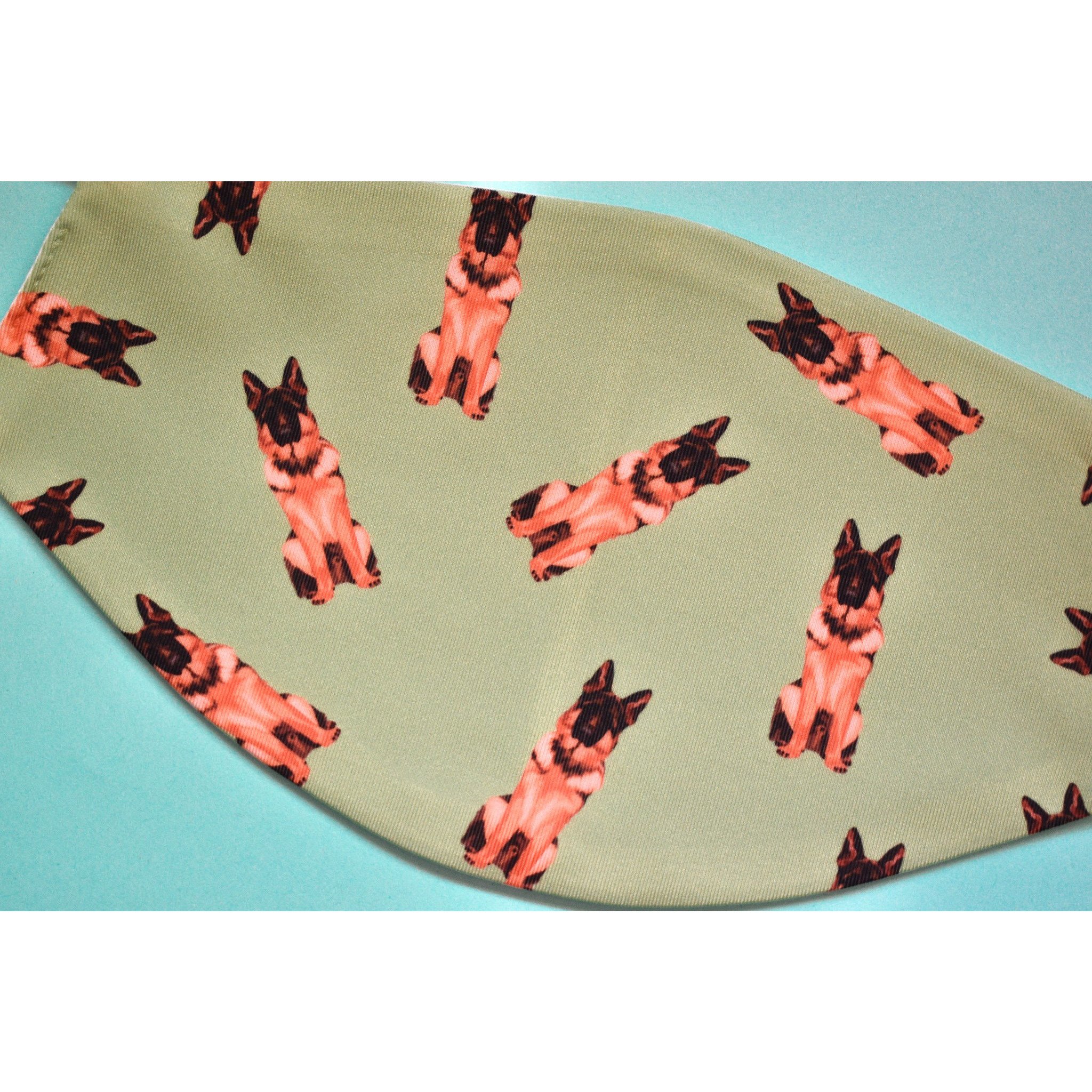 A stylish German Shepherd face cover, handmade with breathable polyester and organic cotton, featuring a unique design for dog lovers.