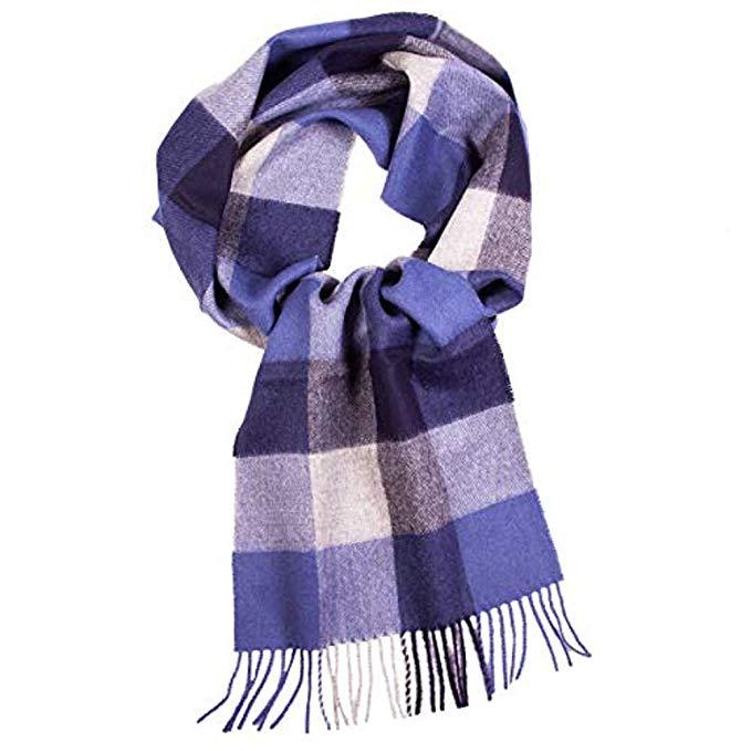 Luxurious blue scarf made from 100% baby alpaca wool, showcasing its soft texture and elegant design.