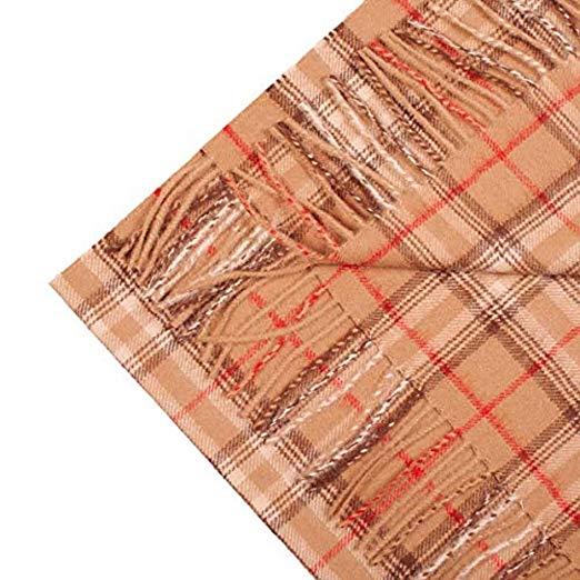 Luxurious camel-colored scarf made from 100% baby alpaca wool, showcasing its soft texture and elegant design.