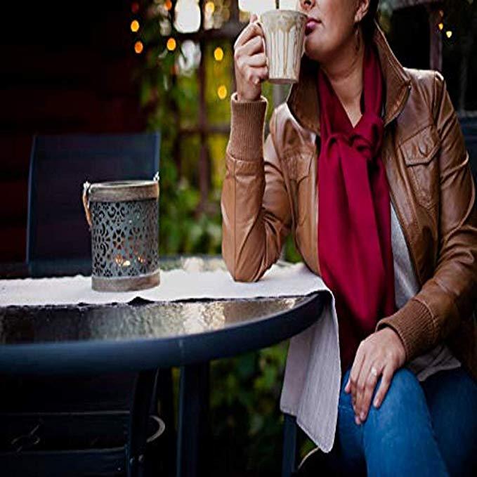 Luxurious 100% baby alpaca scarf in granat color, showcasing its soft texture and elegant design, perfect for winter wear.