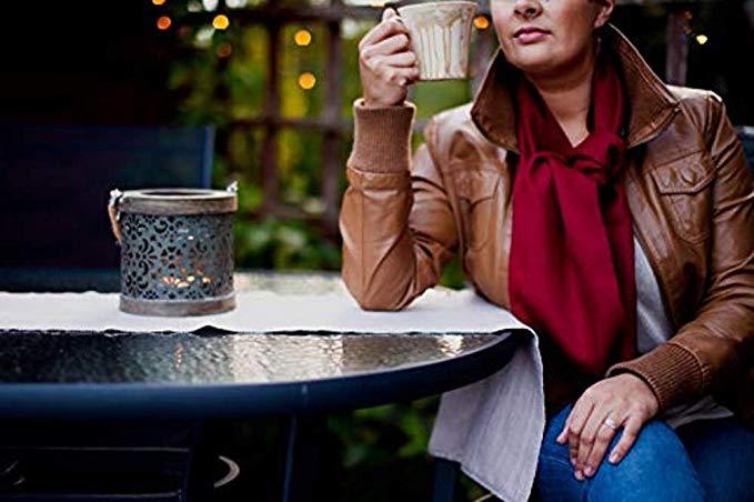 Luxurious 100% baby alpaca scarf in granat color, showcasing its soft texture and elegant design, perfect for winter wear.