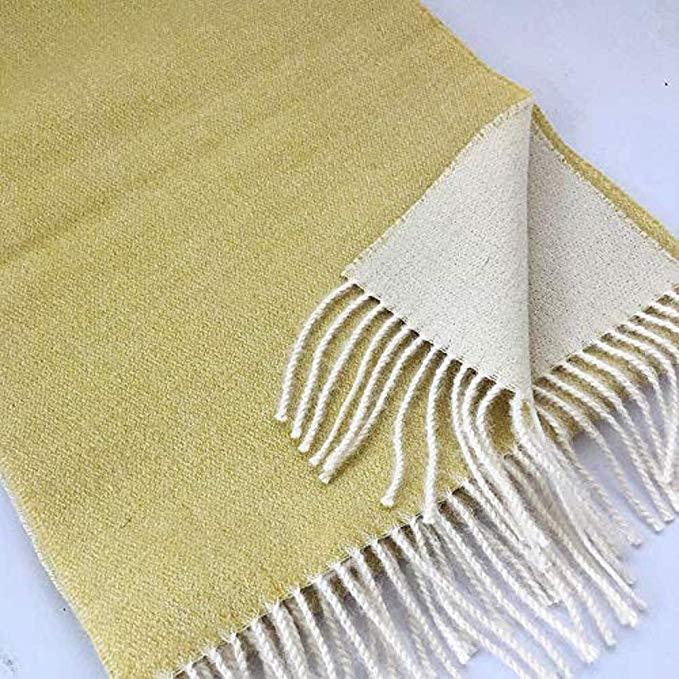 Luxurious yellow-white 100% baby alpaca scarf, showcasing its soft texture and elegant design, perfect for winter wear.