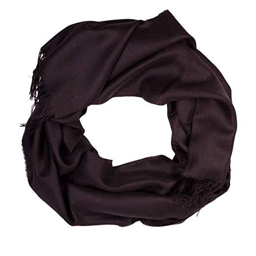 Luxurious black shawl made from 70% baby alpaca and 30% silk, showcasing its soft texture and elegant design.