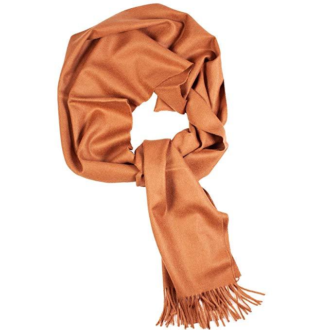 Luxurious camel-colored shawl made from 70% baby alpaca and 30% silk, showcasing its soft texture and elegant design.