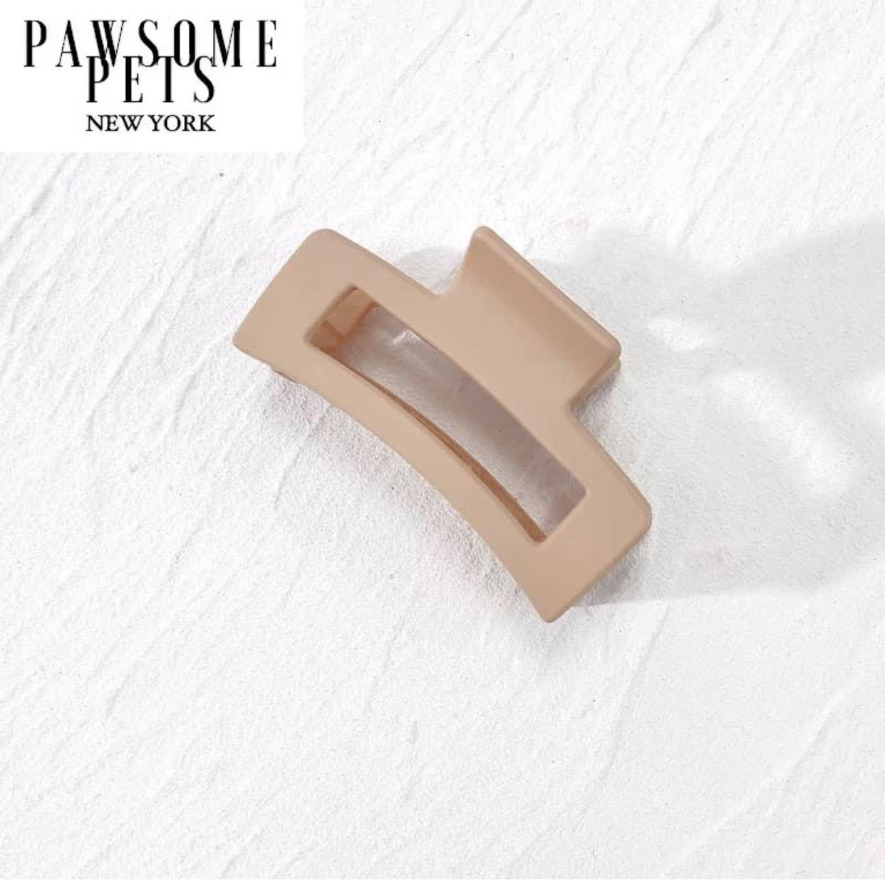 Beige hair claws designed for thick and long hair, showcasing a stylish and functional accessory for various occasions.