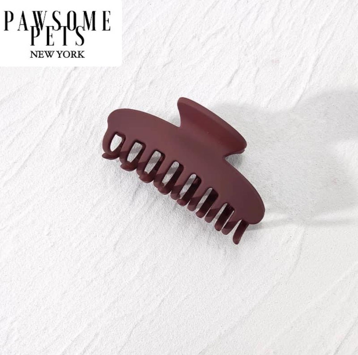 Burgundy hair claws designed for thick and long hair, showcasing a stylish and elegant design.