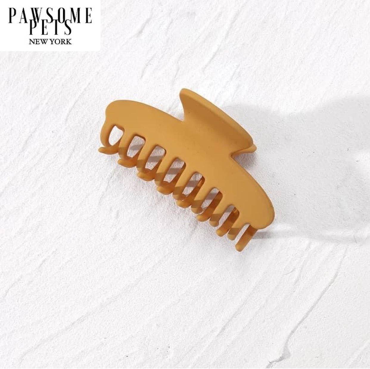 Stylish mustard hair claws designed for thick and long hair, showcasing their elegant design and secure grip.