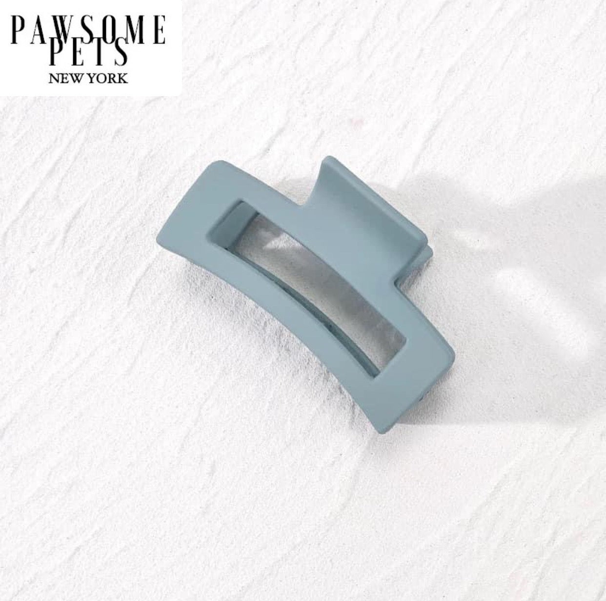 Sky blue hair claws designed for thick and long hair, featuring a stylish and functional design for all-day hold.