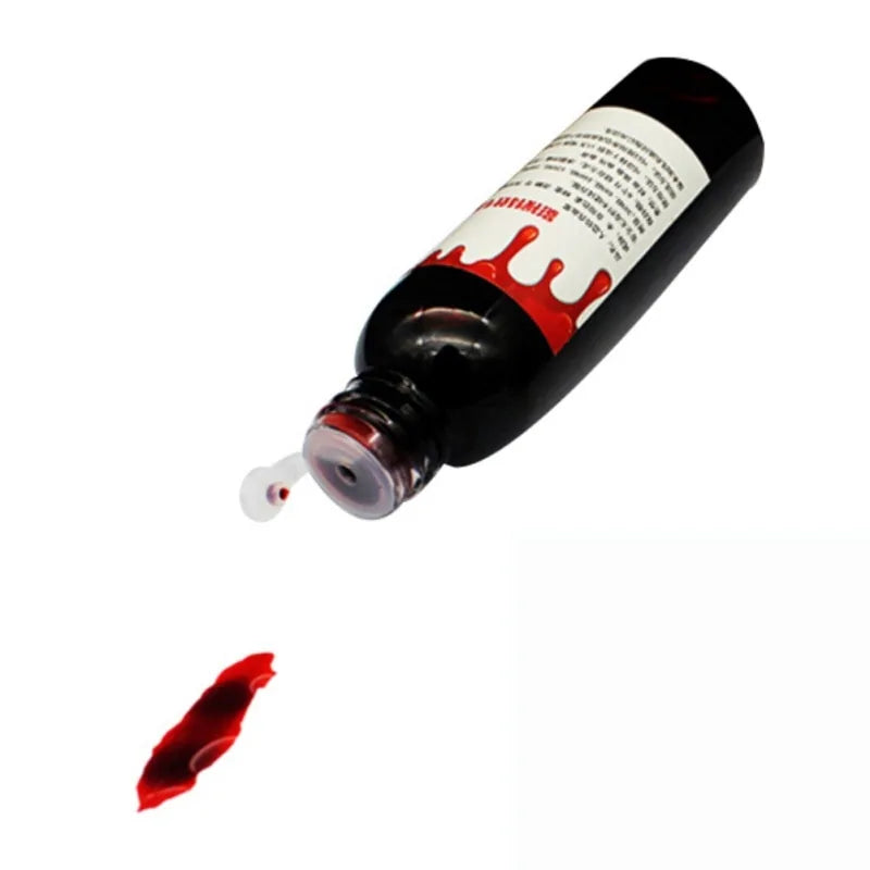 A bottle of ultra-realistic fake blood with a rich red color, perfect for Halloween costumes and special effects makeup.