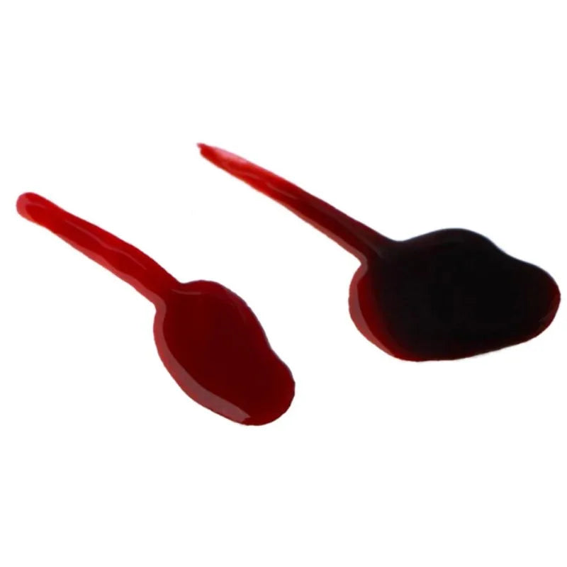 A bottle of ultra-realistic fake blood with a rich red color, perfect for Halloween costumes and special effects makeup.