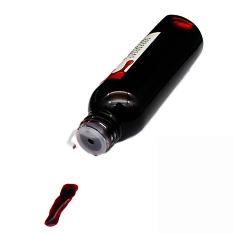 A bottle of ultra-realistic fake blood with a rich red color, perfect for Halloween costumes and special effects makeup.