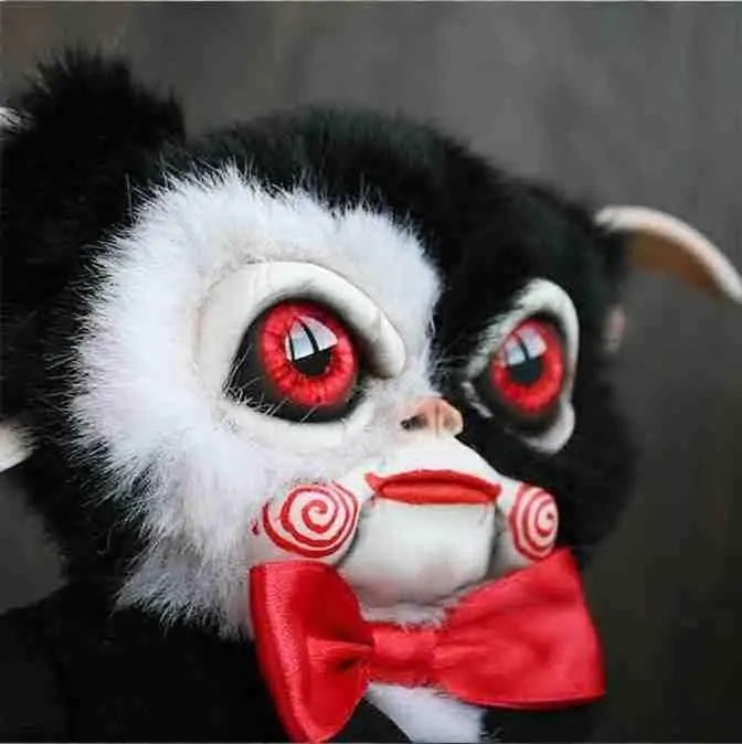 A handcrafted Halloween Mogwai Doll featuring realistic hair and eyes, inspired by the Gremlins character, perfect for spooky decor.