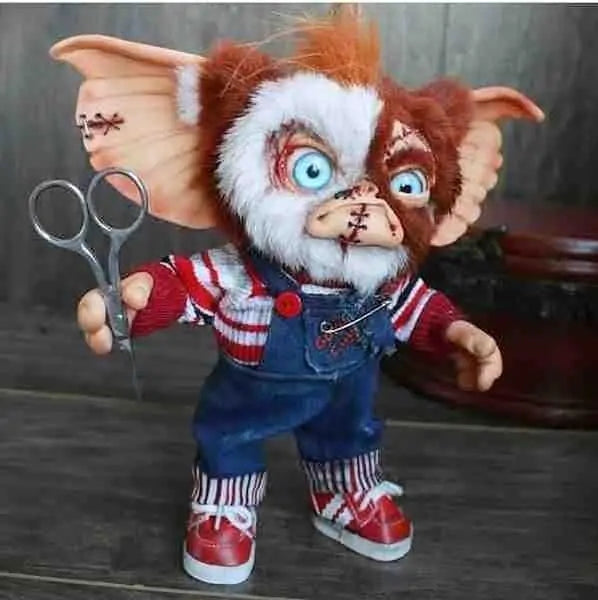 A handcrafted Halloween Mogwai Doll featuring realistic hair and eyes, inspired by the Gremlins character, perfect for spooky decor.