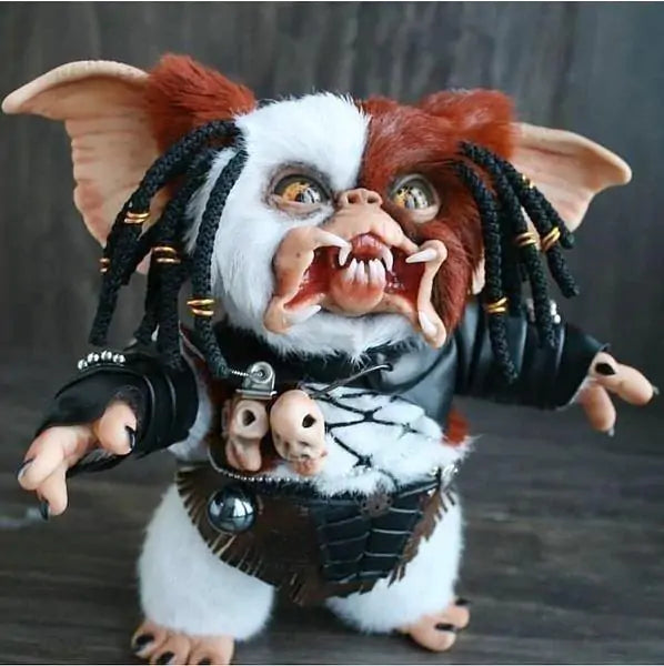 A handcrafted Halloween Mogwai Doll featuring realistic hair and eyes, inspired by the Gremlins character, perfect for spooky decor.