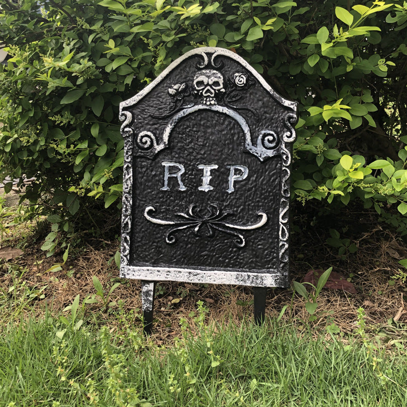 Halloween Party Decoration Plastic Tombstone in black and white, designed to create a spooky atmosphere for Halloween events.