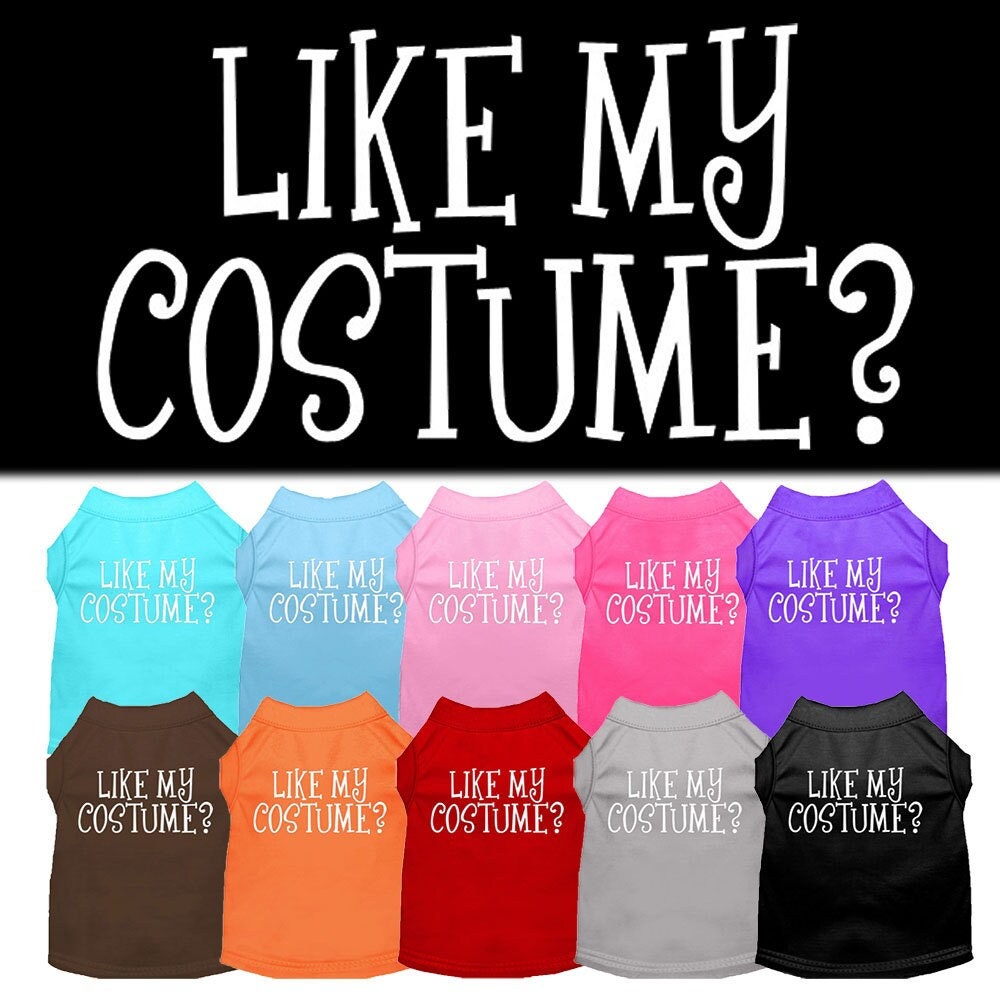 A cute Halloween shirt for dogs and cats, featuring the text 'Like My Costume?' printed on a soft fabric, perfect for festive occasions.