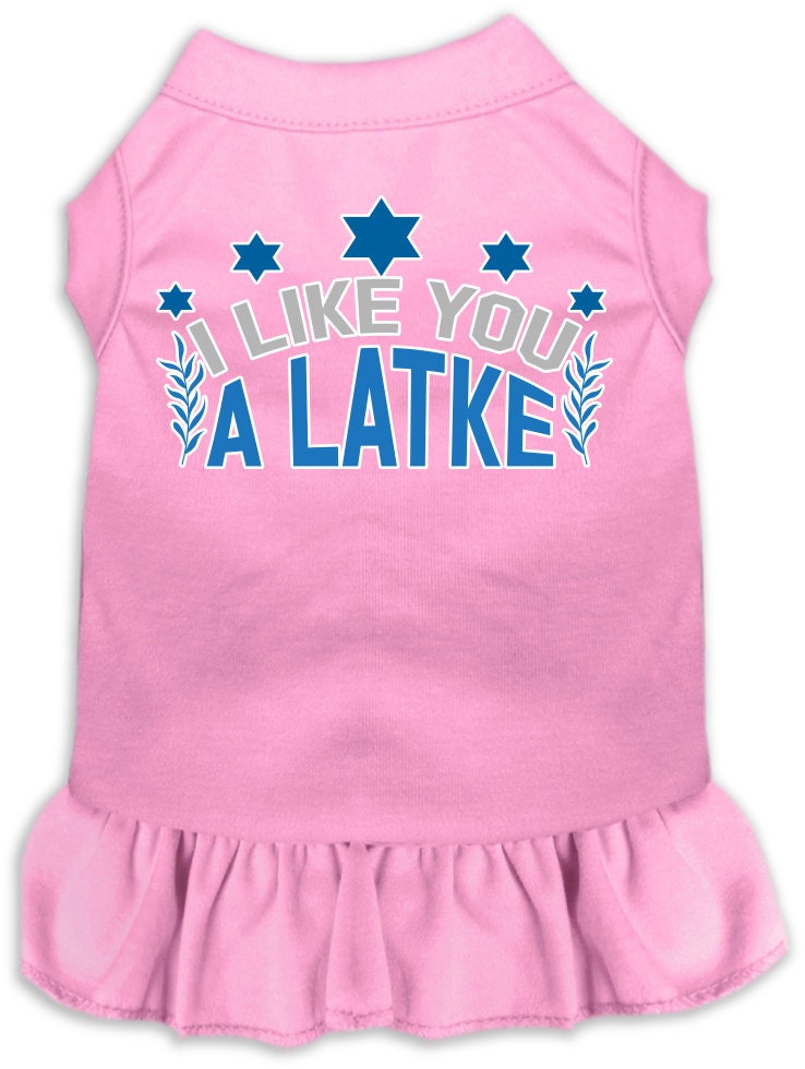 A cute Hanukkah-themed dress for pets, featuring the phrase 'I Like You A Latke' with a ruffled bottom, suitable for dogs and cats.