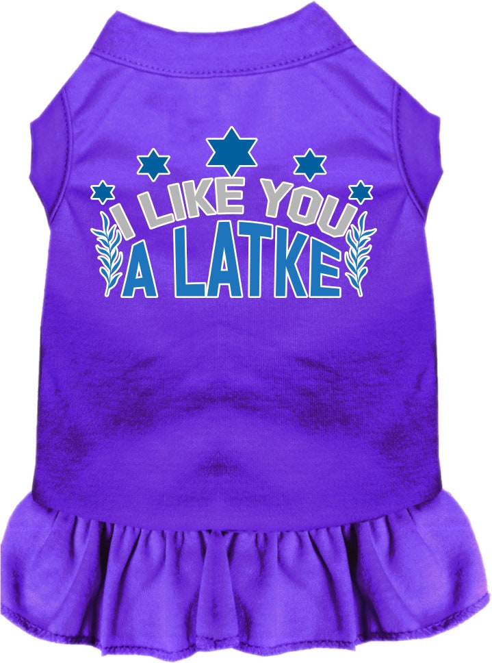 A cute Hanukkah-themed dress for pets, featuring the phrase 'I Like You A Latke' with a ruffled bottom, suitable for dogs and cats.