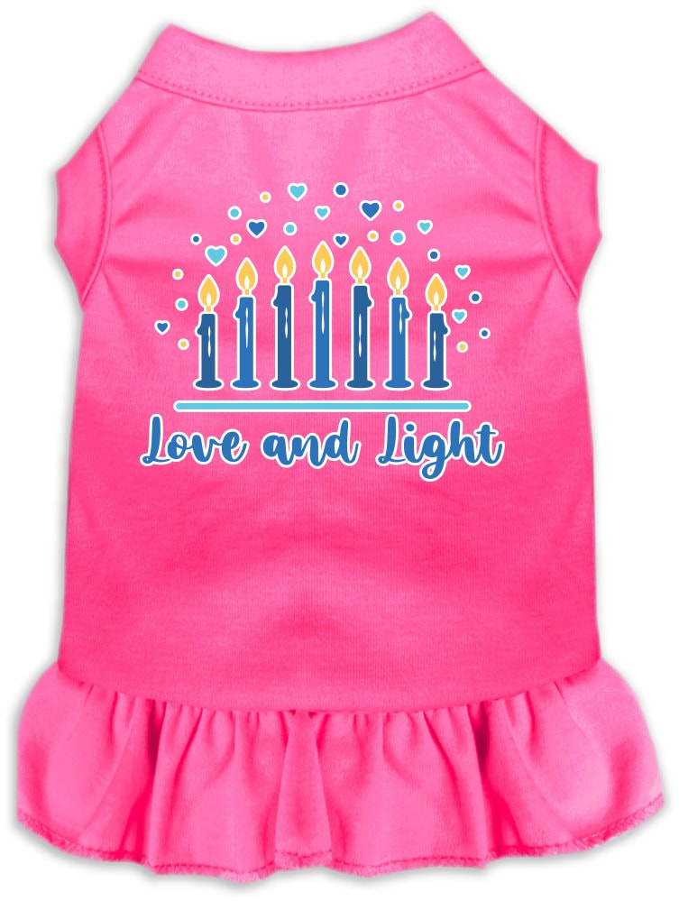 A cute Hanukkah-themed dress for dogs and cats, featuring a 'Love and Light' print with a ruffled bottom, perfect for festive celebrations.