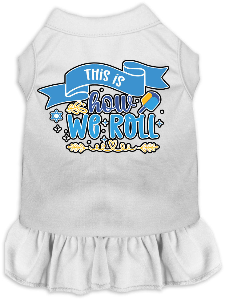 A cute Hanukkah-themed dress for dogs and cats, featuring a ruffled bottom and the phrase 'This Is How We Roll' printed on it.