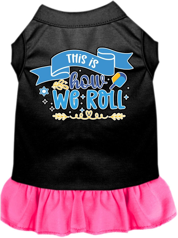 A cute Hanukkah-themed dress for dogs and cats, featuring a ruffled bottom and the phrase 'This Is How We Roll' printed on it.