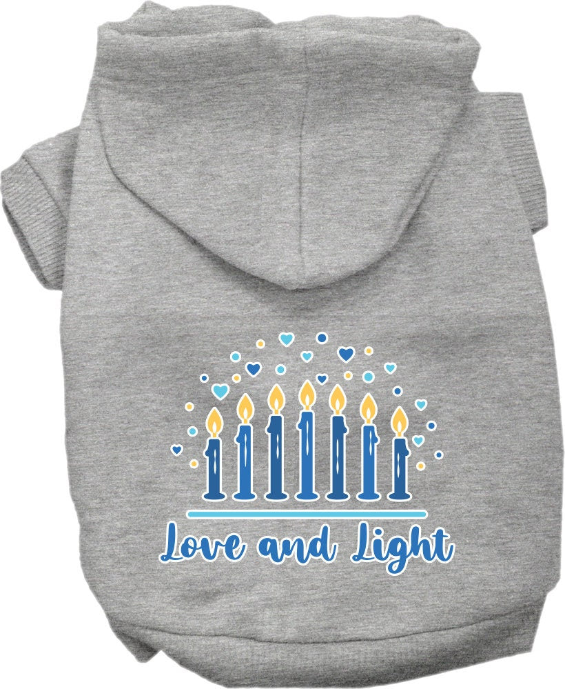 A cozy Hanukkah pet hoodie for dogs and cats, featuring a screen-printed design that reads 'Love and Light', showcasing a festive blue color.