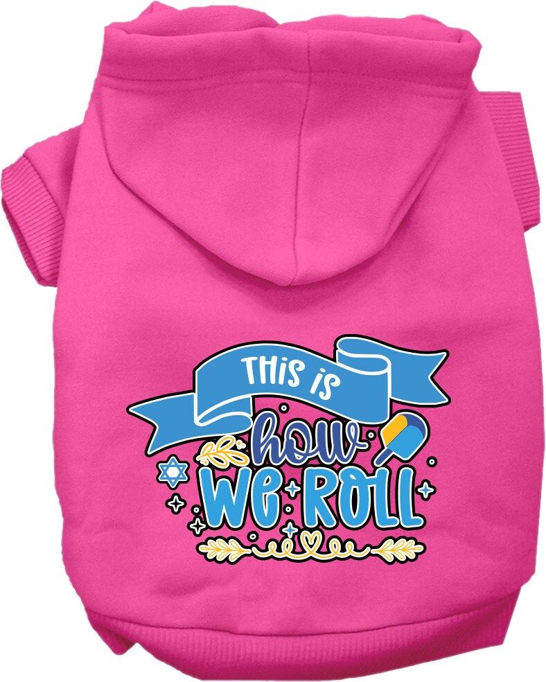 A cozy Hanukkah hoodie for dogs and cats, featuring the phrase 'This Is How We Roll' in festive colors, perfect for holiday celebrations.