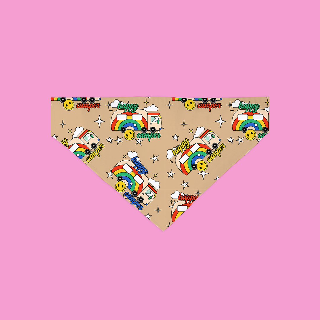 A colorful Happy Camper Bandana designed for dogs, featuring a slip-on design made from ultra-soft polyester fabric, showcasing unique patterns.