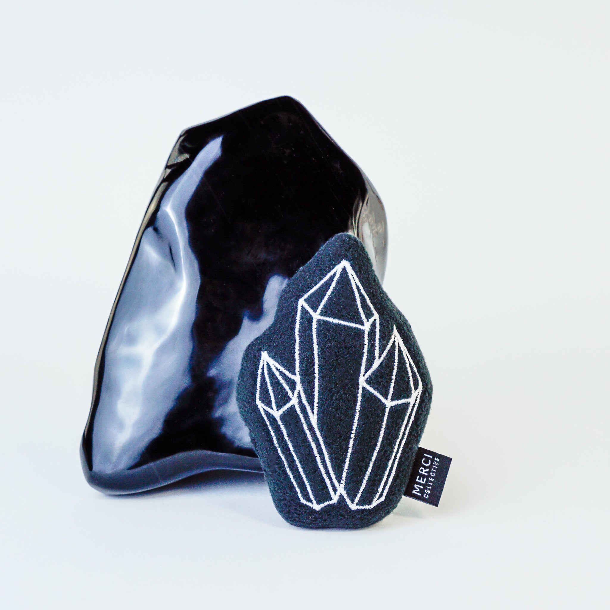 Happy Together cat toy featuring a soft plush exterior, filled with catnip and a healing crystal, designed for feline enjoyment.