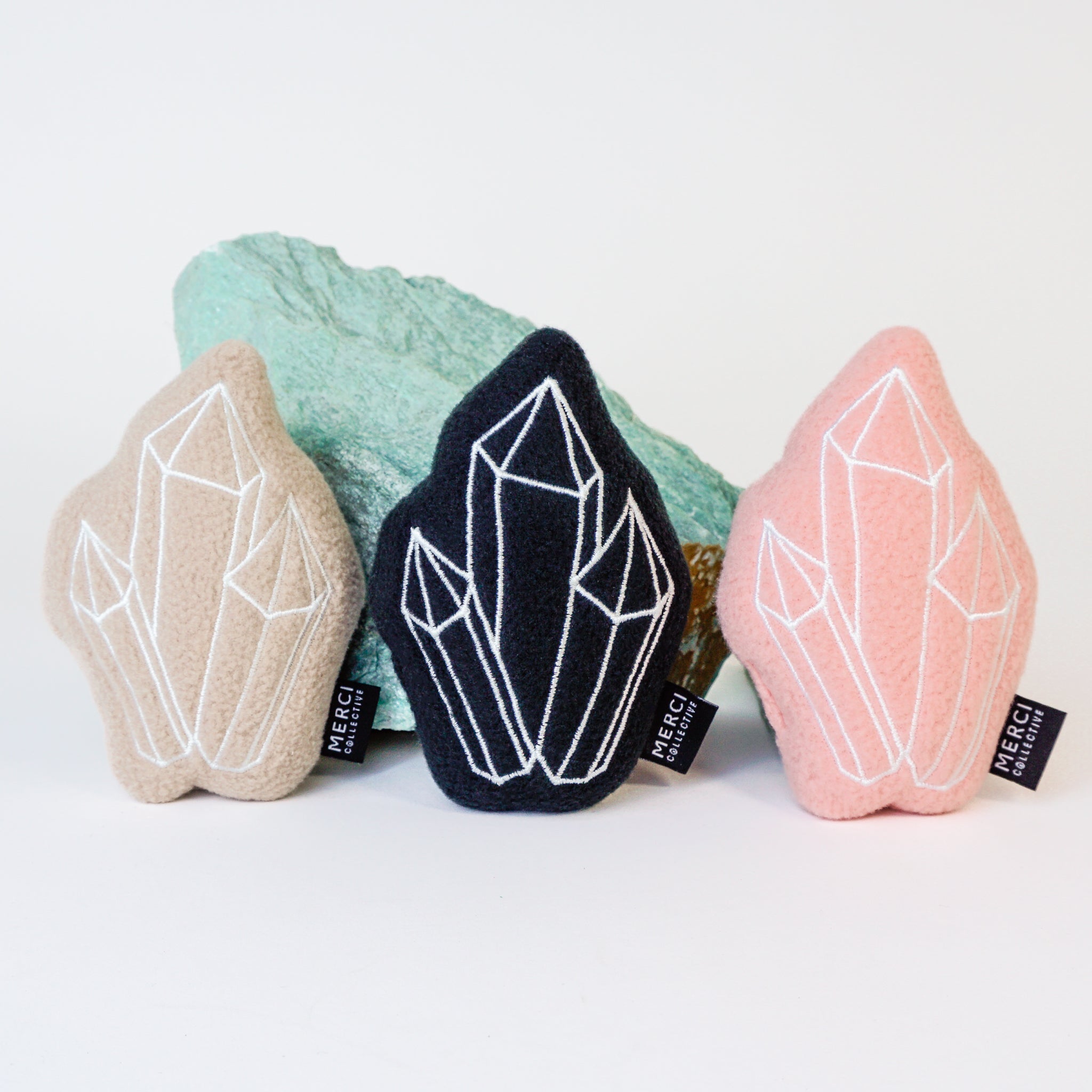 Happy Together cat toy featuring a soft plush exterior, filled with catnip and a healing crystal, designed for feline enjoyment.