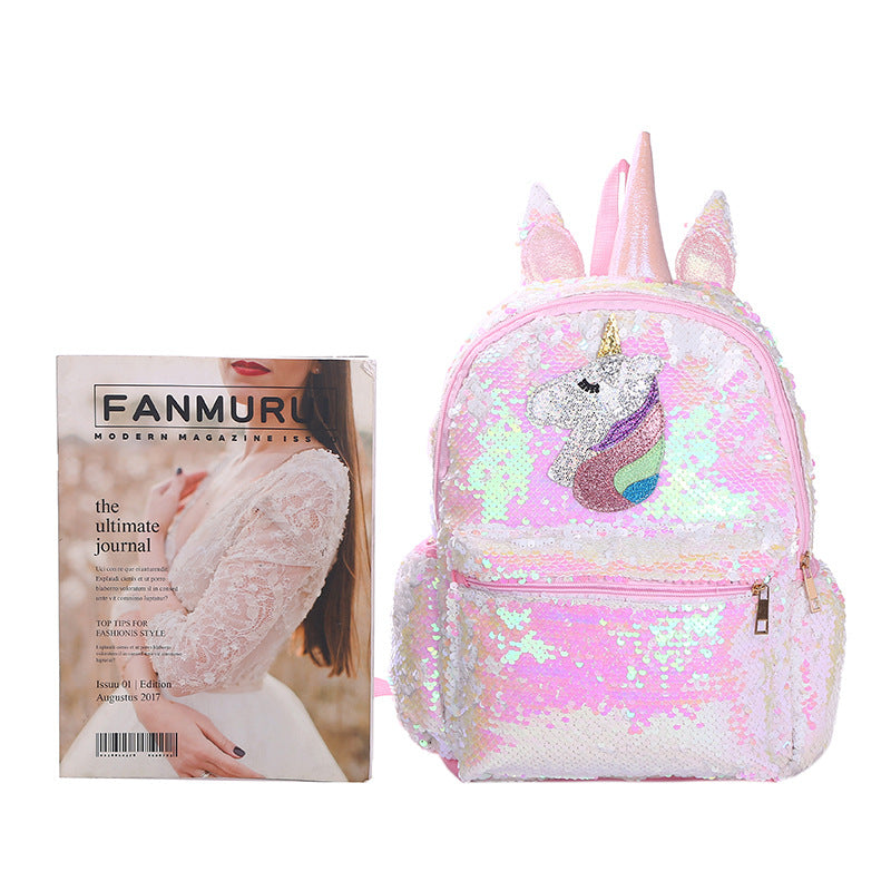 Colorful unicorn backpack with sequins, adjustable straps, and side pockets, made from recycled materials.