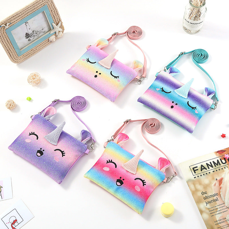 Colorful unicorn crossbody bag for girls with sequins, adjustable straps, and multiple pockets.