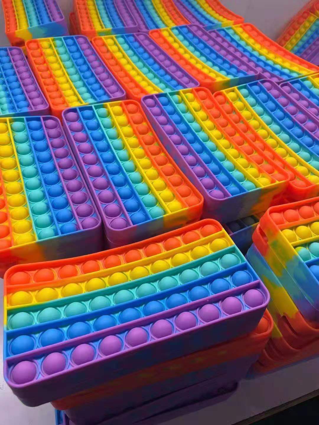 Colorful Push Pop Fidget Sensory Bag-Pencil case made of high-quality silicone, featuring multiple popping bubbles for stress relief and entertainment.