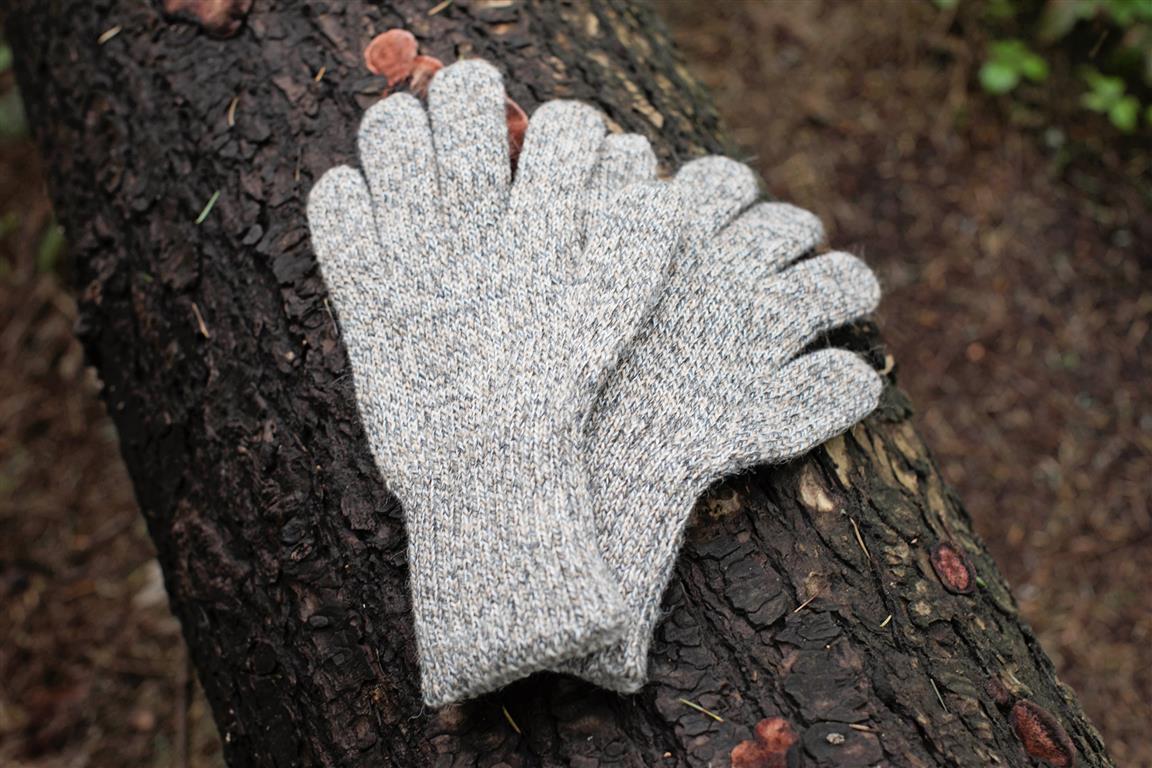 Iditarod 100% Alpaca Double-Thick Reversible Gloves in various colors, showcasing their stylish and functional design for extreme weather.