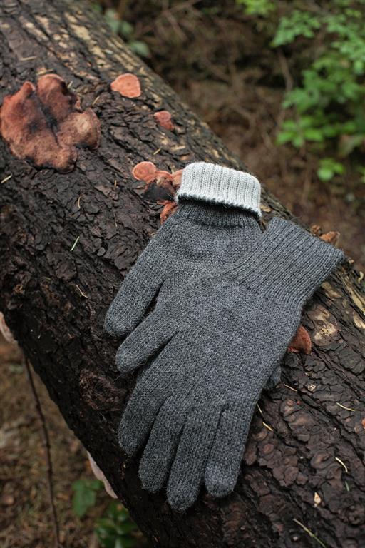 Iditarod 100% Alpaca Double-Thick Reversible Gloves in various colors, showcasing their stylish and functional design for extreme weather.