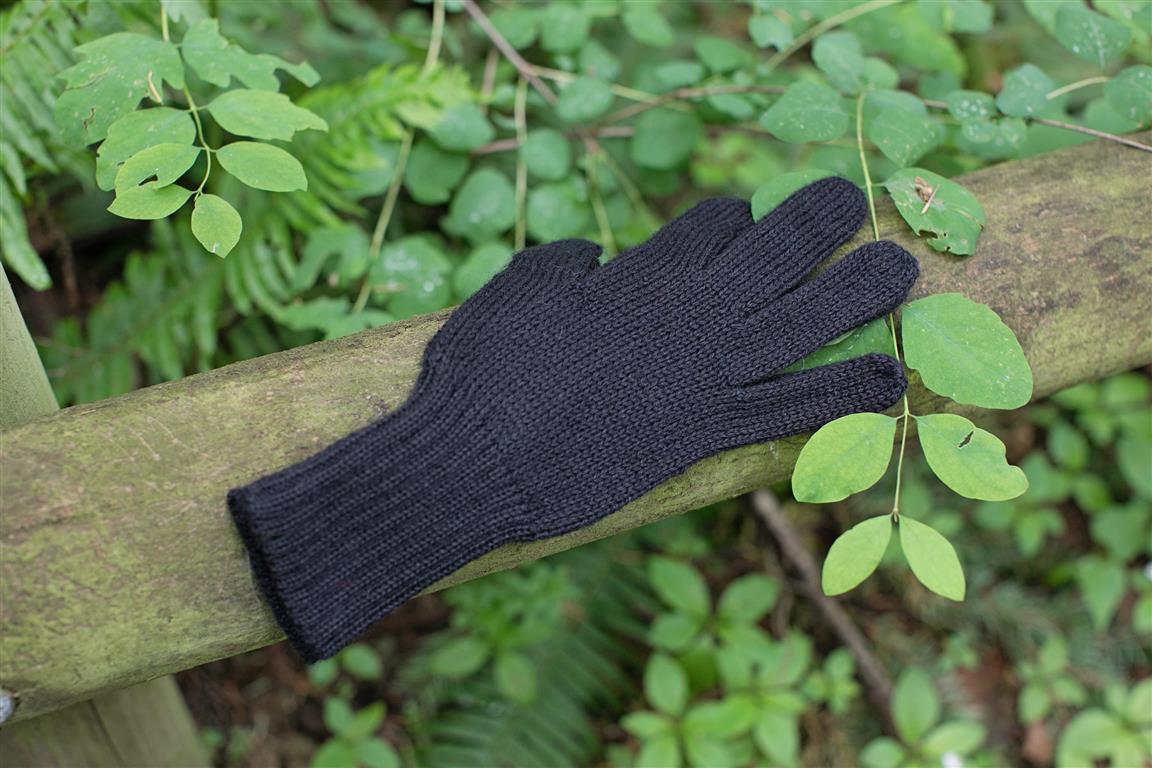 Iditarod 100% Alpaca Double-Thick Reversible Gloves in various colors, showcasing their stylish and functional design for extreme weather.