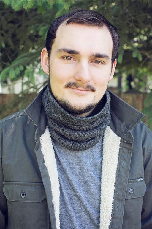 Iditarod Baby Alpaca Neck Gator in black and grey, showcasing soft fleece lining and stylish design.