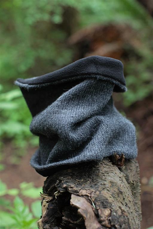 Iditarod Baby Alpaca Neck Gator in black and grey, showcasing soft fleece lining and stylish design.