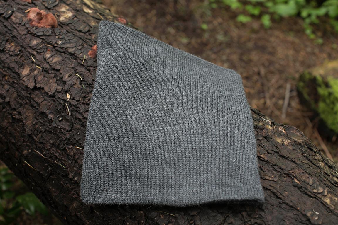 Iditarod Baby Alpaca Neck Gator in black and grey, showcasing soft fleece lining and stylish design.
