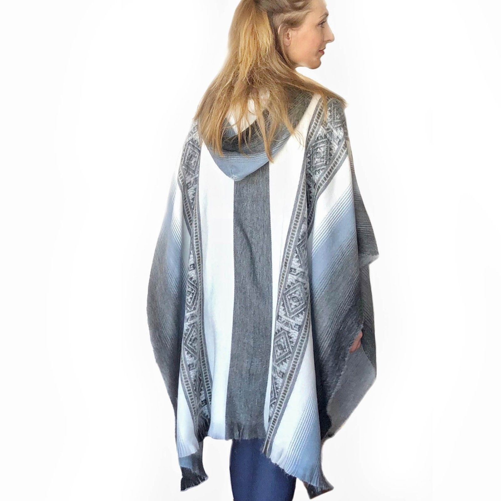 Incan Grays Alpaca Poncho featuring intricate gray patterns with subtle blue accents, showcasing its soft texture and stylish design.