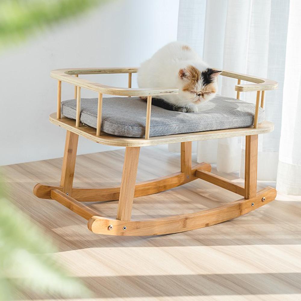 INSTACHEW Rockaby Pet Bed in grey and brown, featuring a soft cushion and bamboo wooden frame, designed for small to medium pets.