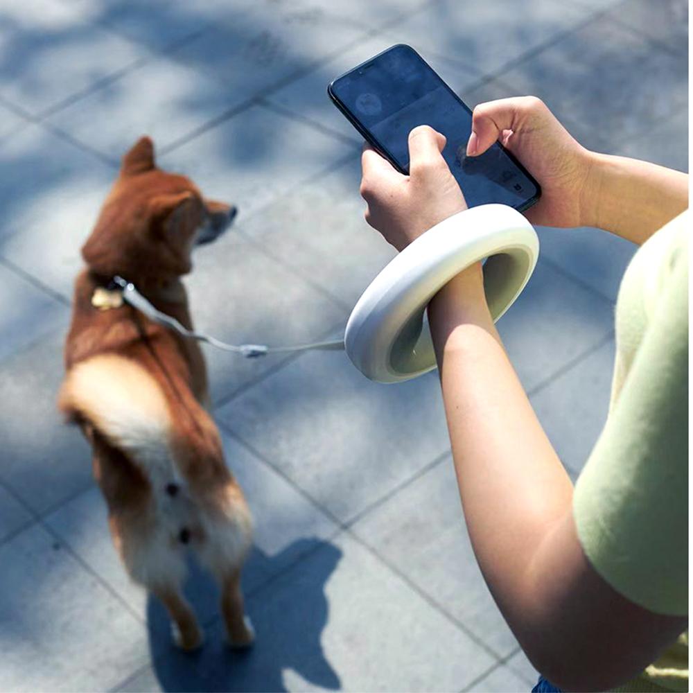 INSTACHEW Smart Space Leash for pets, featuring a retractable design and a matching waist belt for hands-free walking.