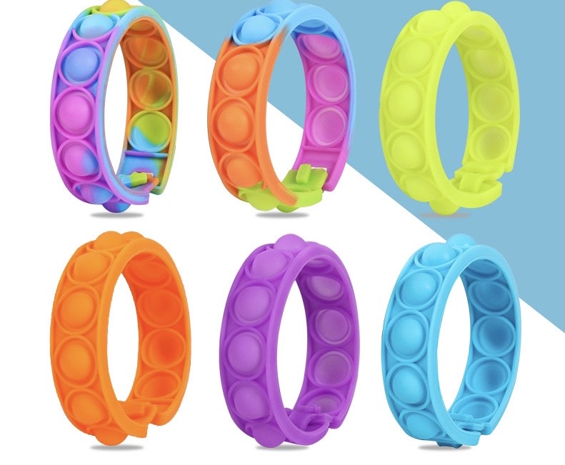A colorful Jumbo Push Pop Fidget Sensory Bracelet showcasing its large bubbles and durable silicone material, perfect for stress relief and fun.