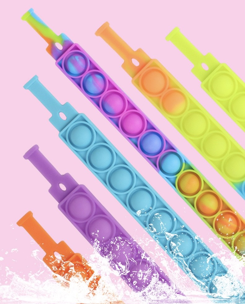 A colorful Jumbo Push Pop Fidget Sensory Bracelet showcasing its large bubbles and durable silicone material, perfect for stress relief and fun.