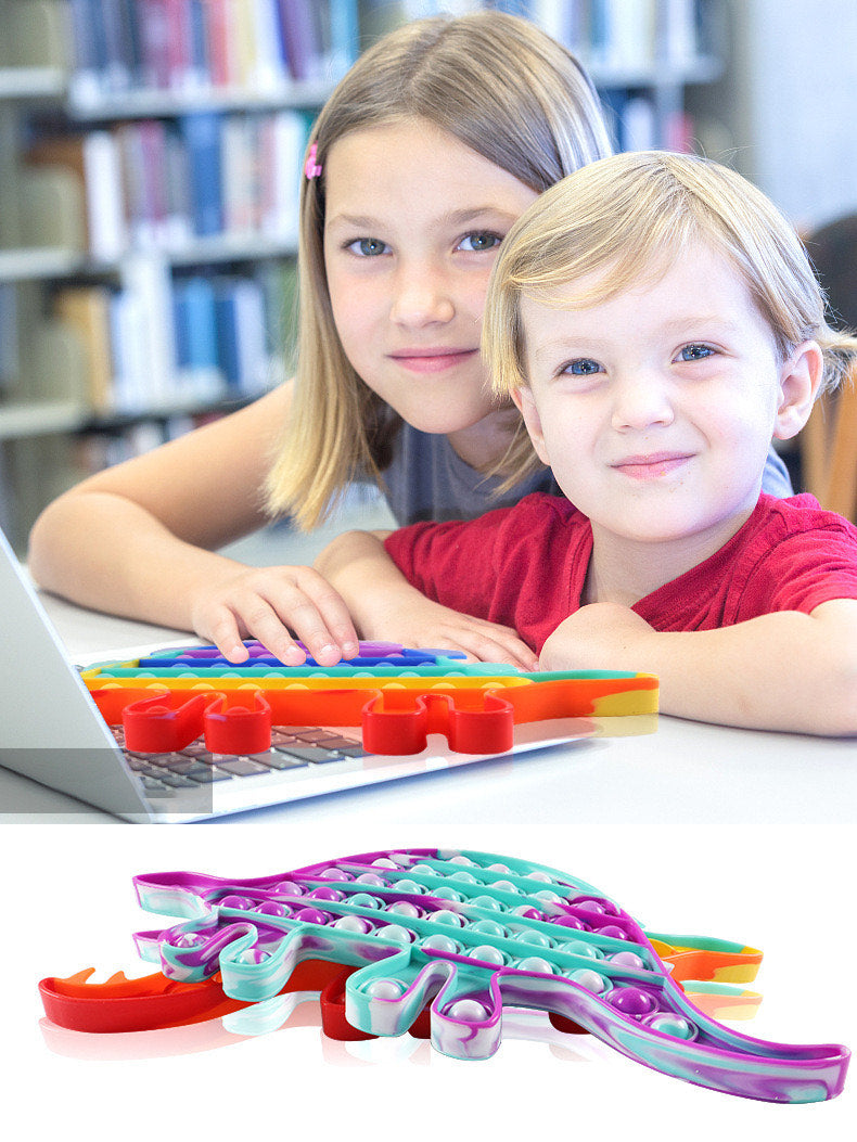 A colorful Jumbo Push Pop Fidget Sensory Bracelet showcasing its large bubbles and durable silicone material, perfect for stress relief and fun.