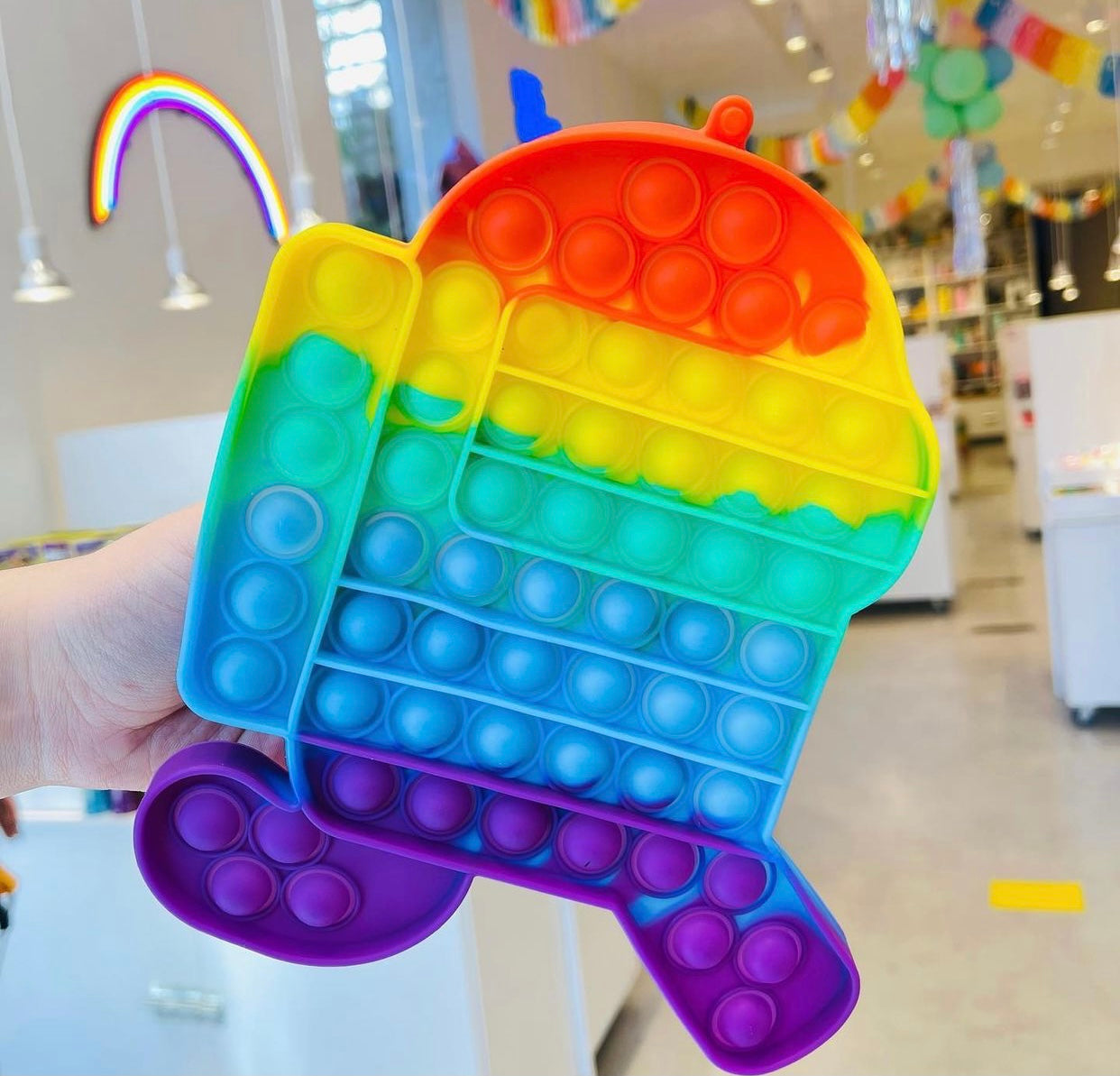 Jumbo Push Pop Fidget Sensory Robot toy in vibrant colors, showcasing its large size and unique robot design, perfect for stress relief and cognitive development.