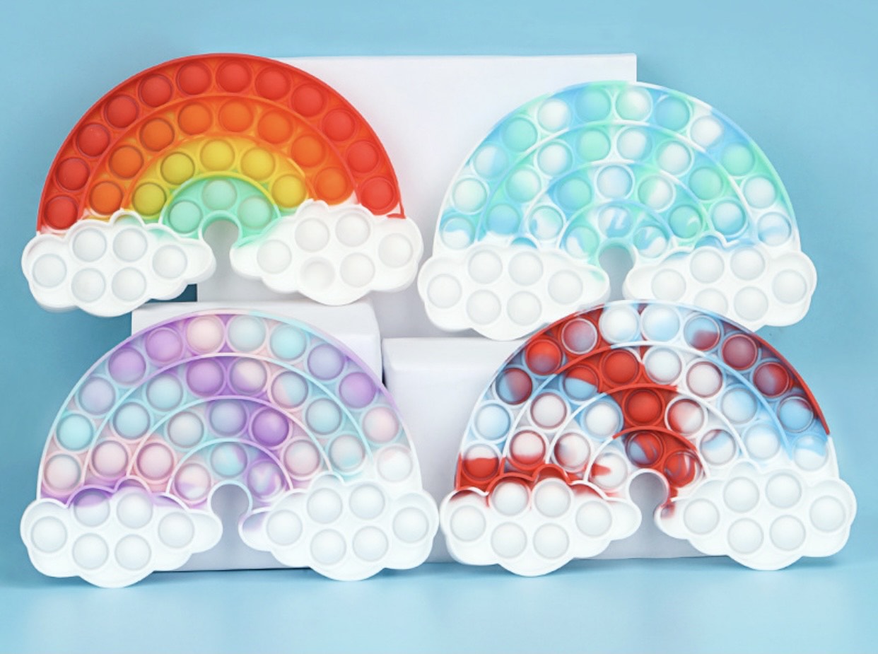 Jumbo Push Pop Fidget Sensory Toy in vibrant Cloud Rainbow colors, showcasing its large size and durable silicone material.