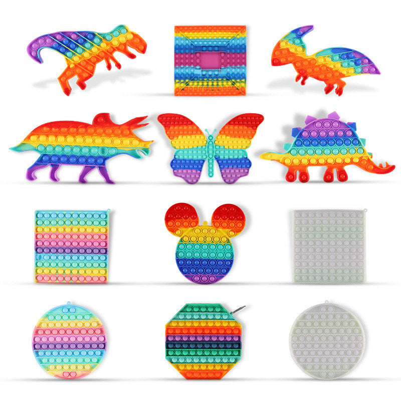 A colorful Jumbo Push Pop Fidget Toy shaped like animals, made of durable silicone, designed for sensory play and stress relief.