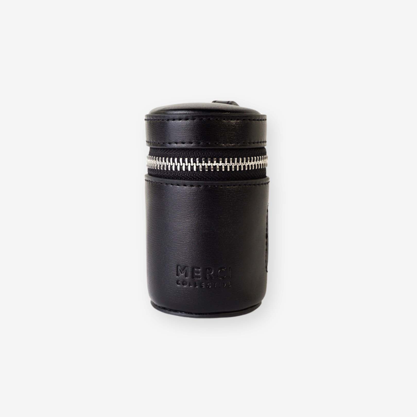 Just Did It poop bag holder featuring a stylish design, side slit for easy bag access, and a carabiner for secure attachment.